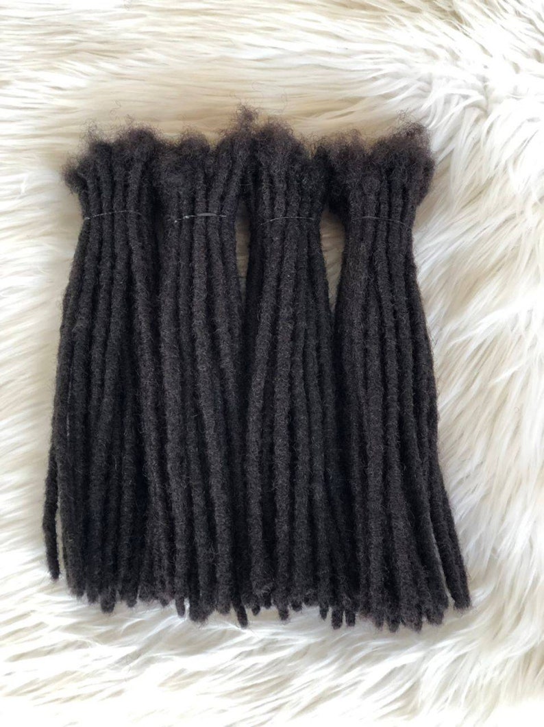 Human hair dreadlock extensions in sizes 0.4 cm and nil.6cm. Bundles of 30locs